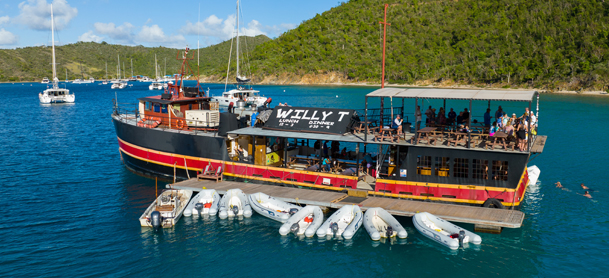 Sail To The Legendary Willy T: How To Reach The BVI’s Floating Pirate Bar Of Rum, Grub & Grog